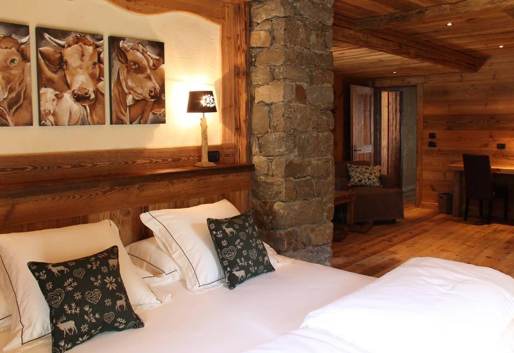 Bed and Breakfast Les Trompeurs Chez Odette Cogne Pokoj fotografie
